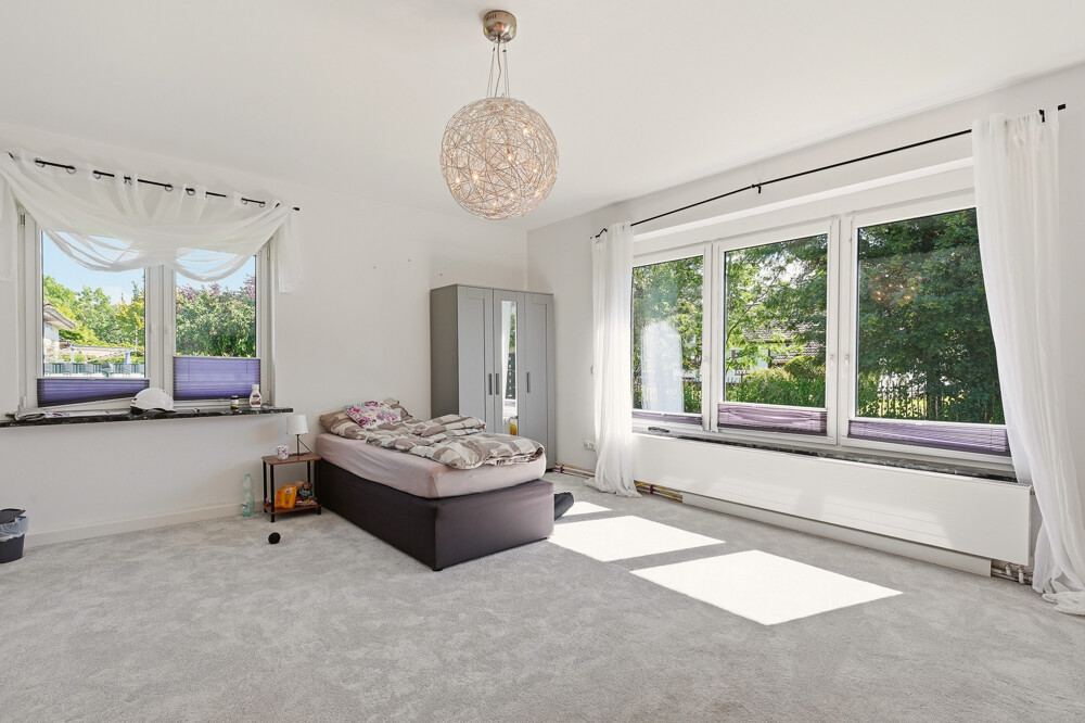 Schlafzimmer des Mehrfamilienhauses in Brokdorf, Aufnahme 4.
