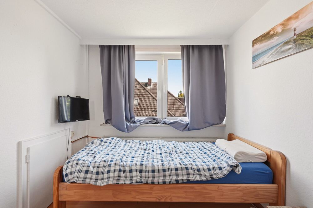 Schlafzimmer des Mehrfamilienhauses in Brokdorf, Aufnahme 5.